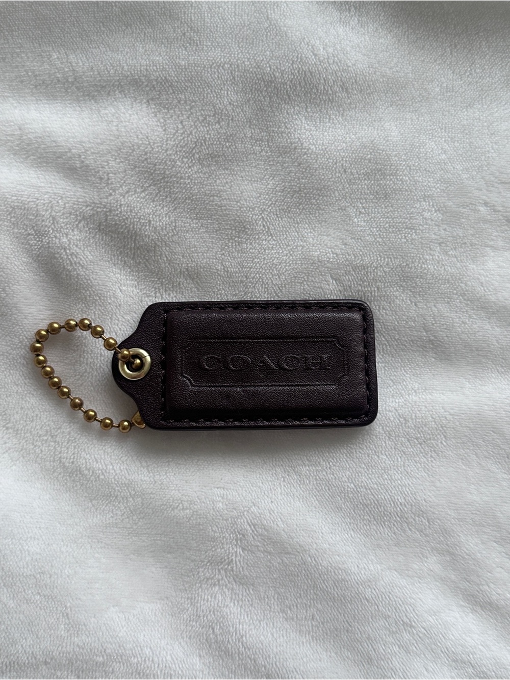 Coach Hang Tag